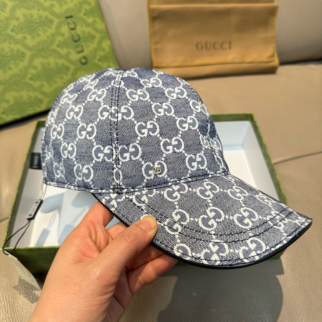 Gucci GG-print cap in dark navy with white monogram pattern, curved brim