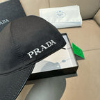Prada black cap close-up with PRADA front lettering on the crown