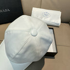 White Prada baseball cap with top seam lines and small crown button