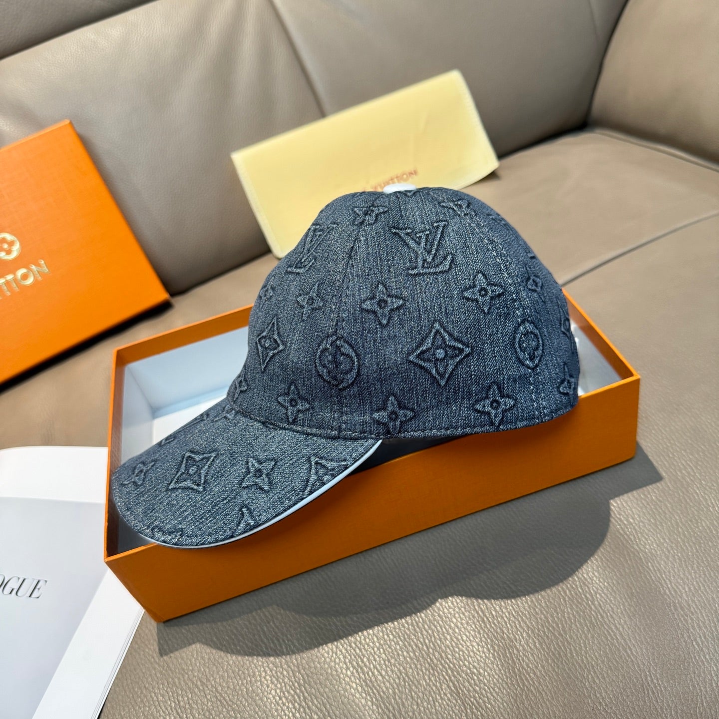 Denim blue patterned baseball cap with Louis Vuitton monogram motifs and curved brim