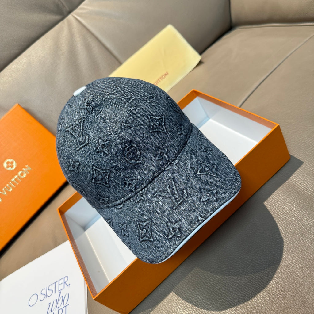 Denim blue Louis Vuitton monogram baseball cap with curved brim and stitched pattern