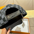 Louis Vuitton baseball cap interior with logo patch, dark checkered fabric