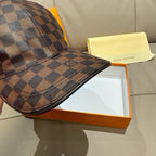 Louis Vuitton checkered baseball cap side view with curved brim, brown and blue-gray grid