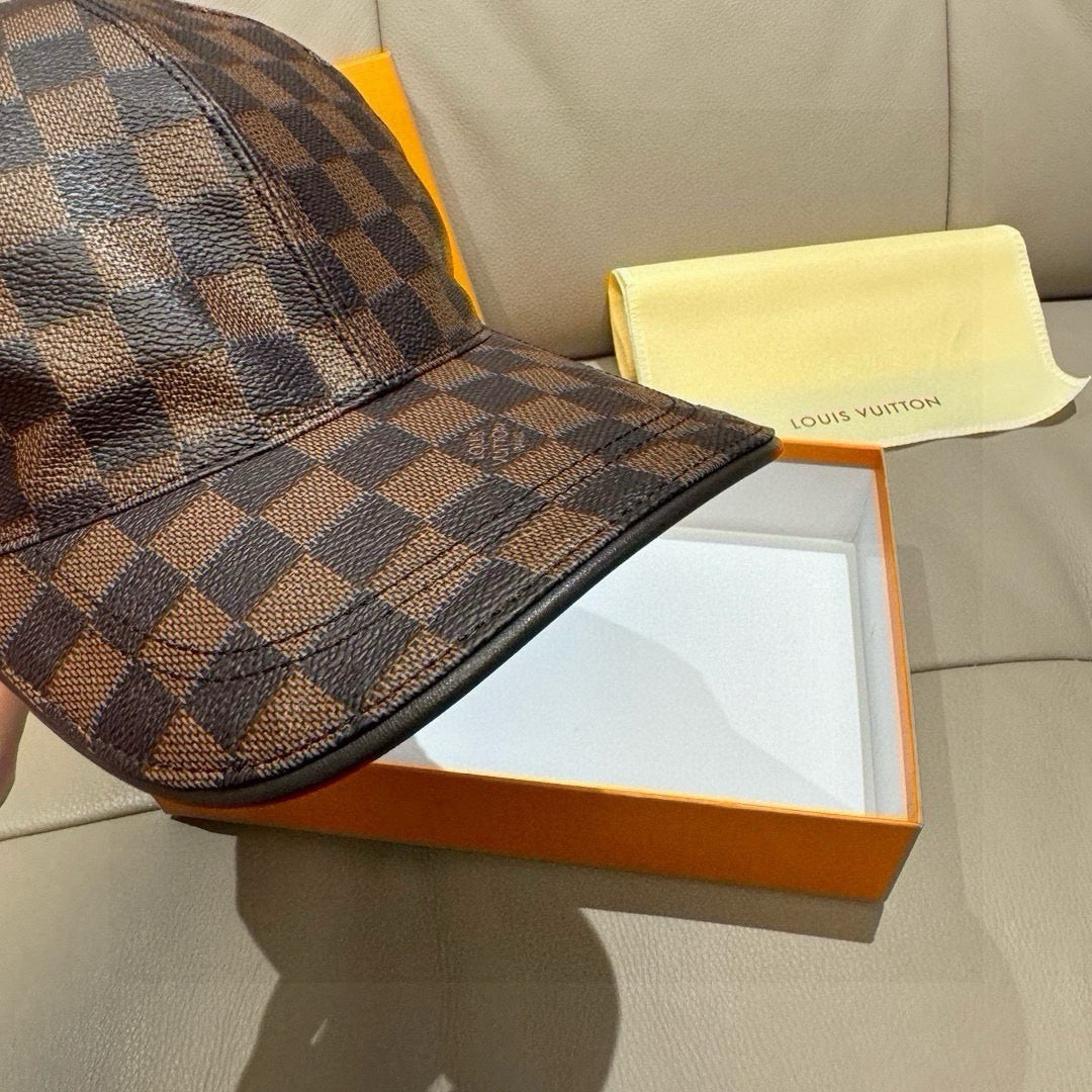 Louis Vuitton checkered baseball cap side view with curved brim, brown and blue-gray grid