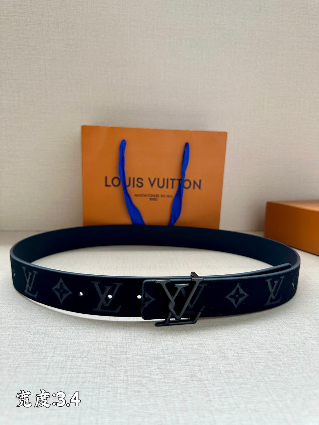 Louis Vuitton belt in dark blue with monogram pattern and silver-tone buckle