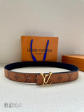 Monogram leather belt with gold-tone V buckle, tan/brown strap and dark backing