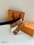 Monogram leather belt with gold-tone V buckle, tan/brown strap with repeating LV symbols