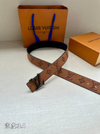 Louis Vuitton belt with brown monogram pattern and dark metal buckle