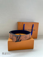 Louis Vuitton belt side view with brown monogram strap and dark metal buckle