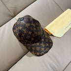 Louis Vuitton monogram baseball cap, dark brown/gold, curved brim and button top