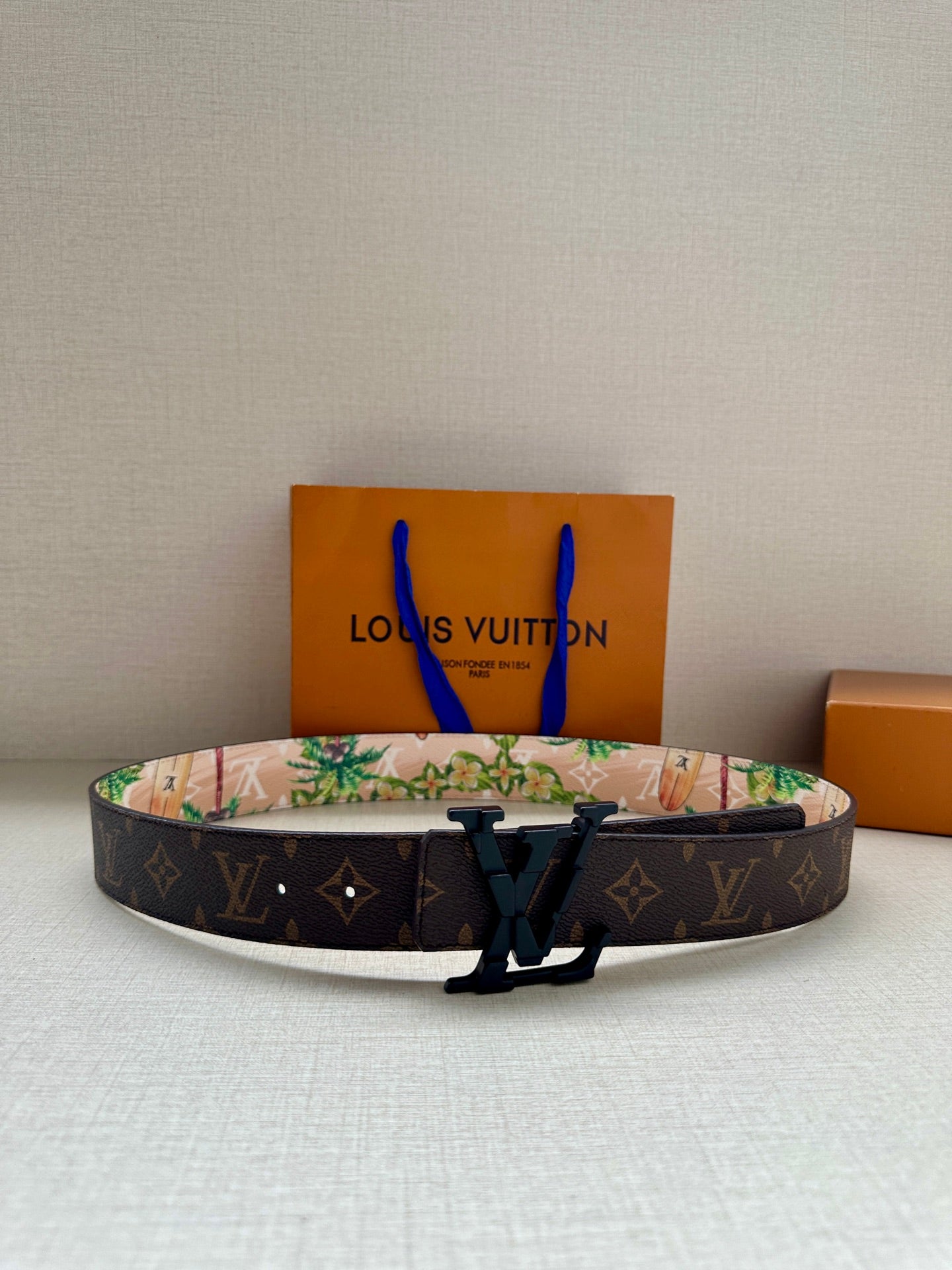 Louis Vuitton monogram belt with black LV buckle