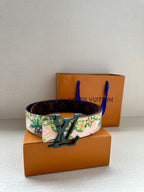 Louis Vuitton belt, floral strap with green LV buckle and dark monogram reverse