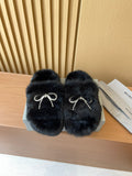 Balenciaga fuzzy sandals in dark color with jeweled bow strap