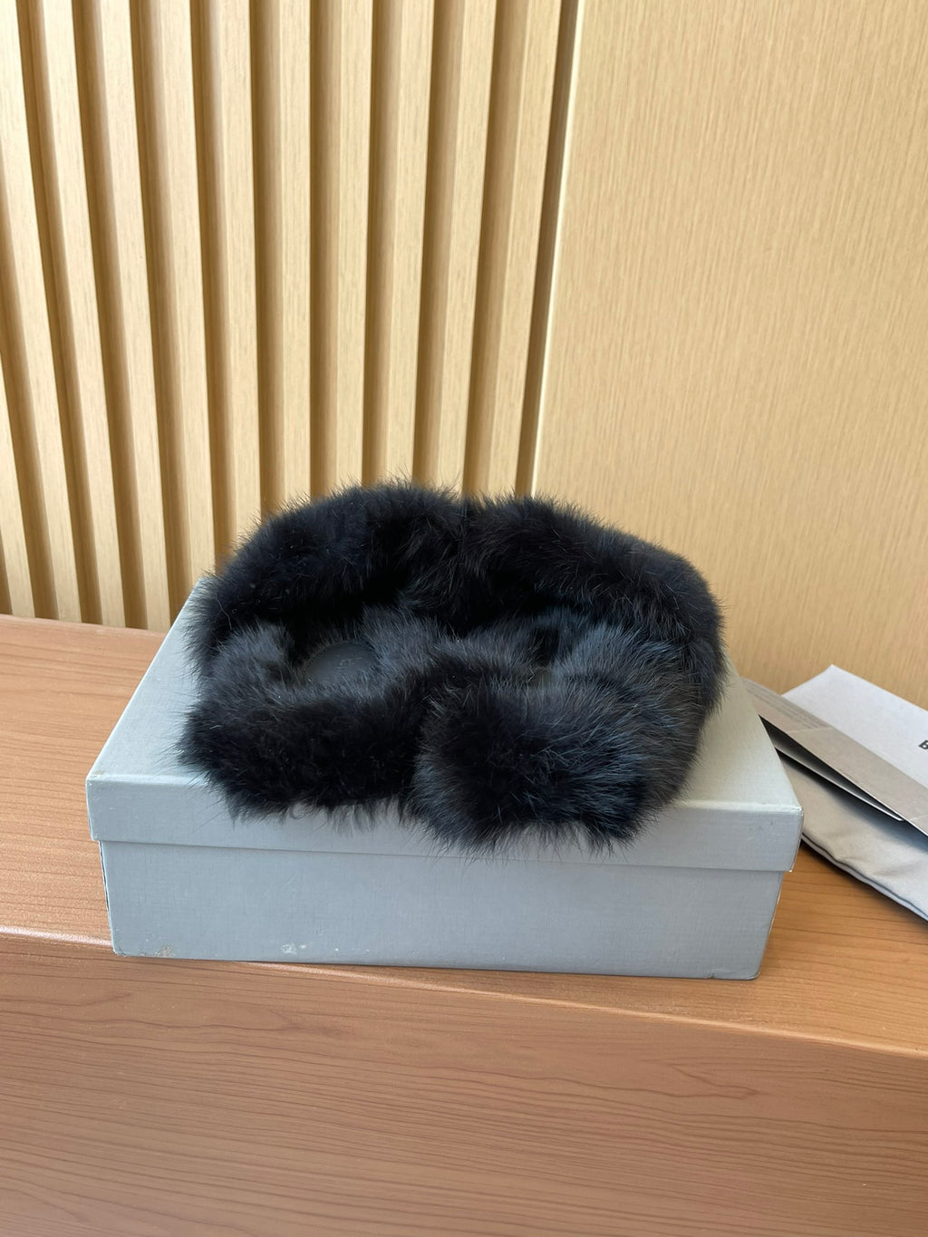 Balenciaga dark fuzzy slide sandals with open toe and plush texture