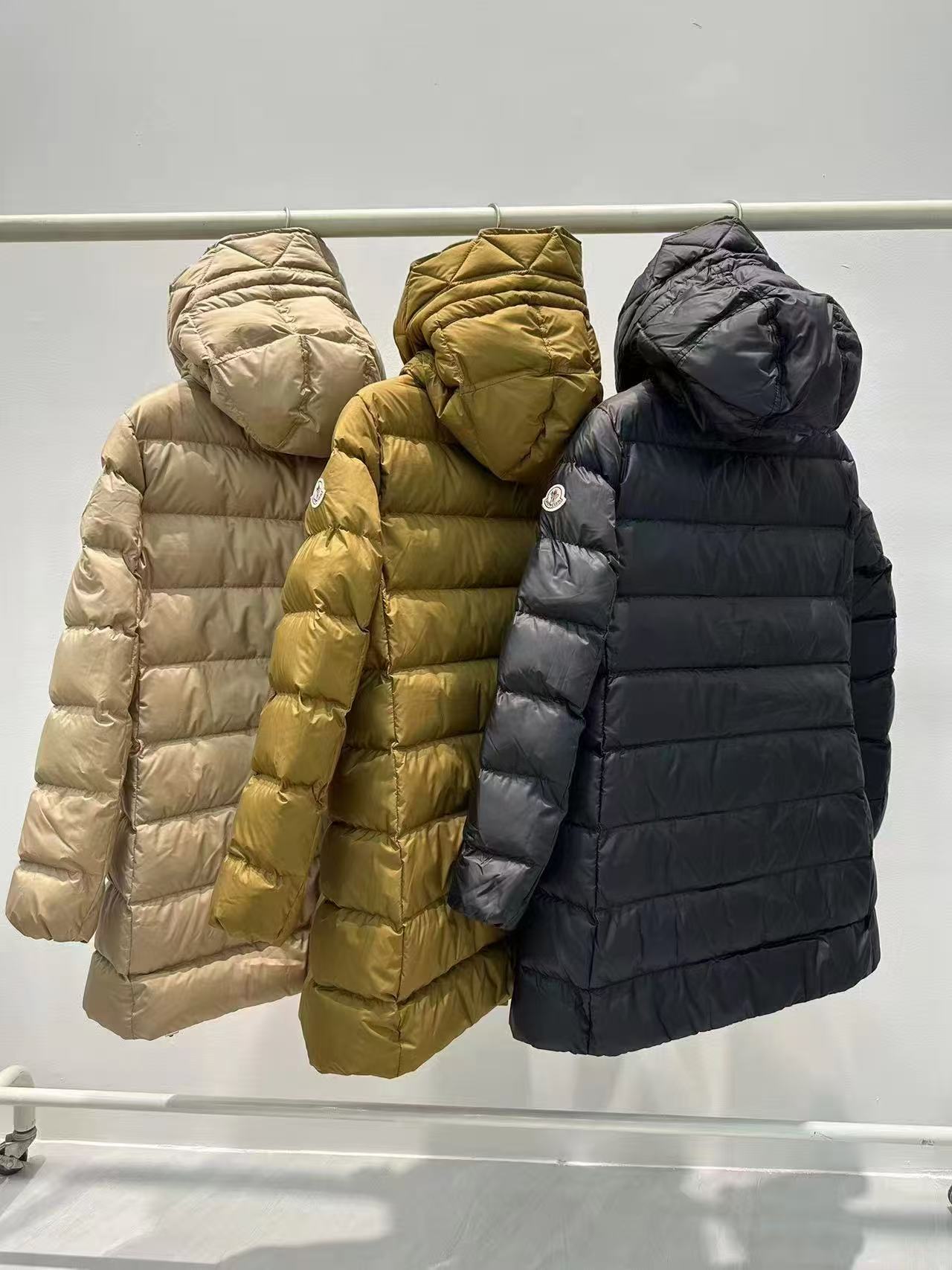 Long puffer coats, light beige, olive and dark blue, hooded with zip fronts