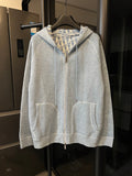 Light gray zip-up hoodie with hood and two front pockets