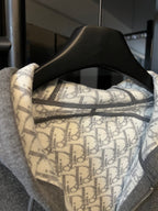 Gray heather zip-up hoodie with monogram-lined hood interior