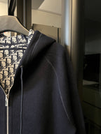 Navy zip-up hoodie with sleeve detail and Dior monogram hood lining.