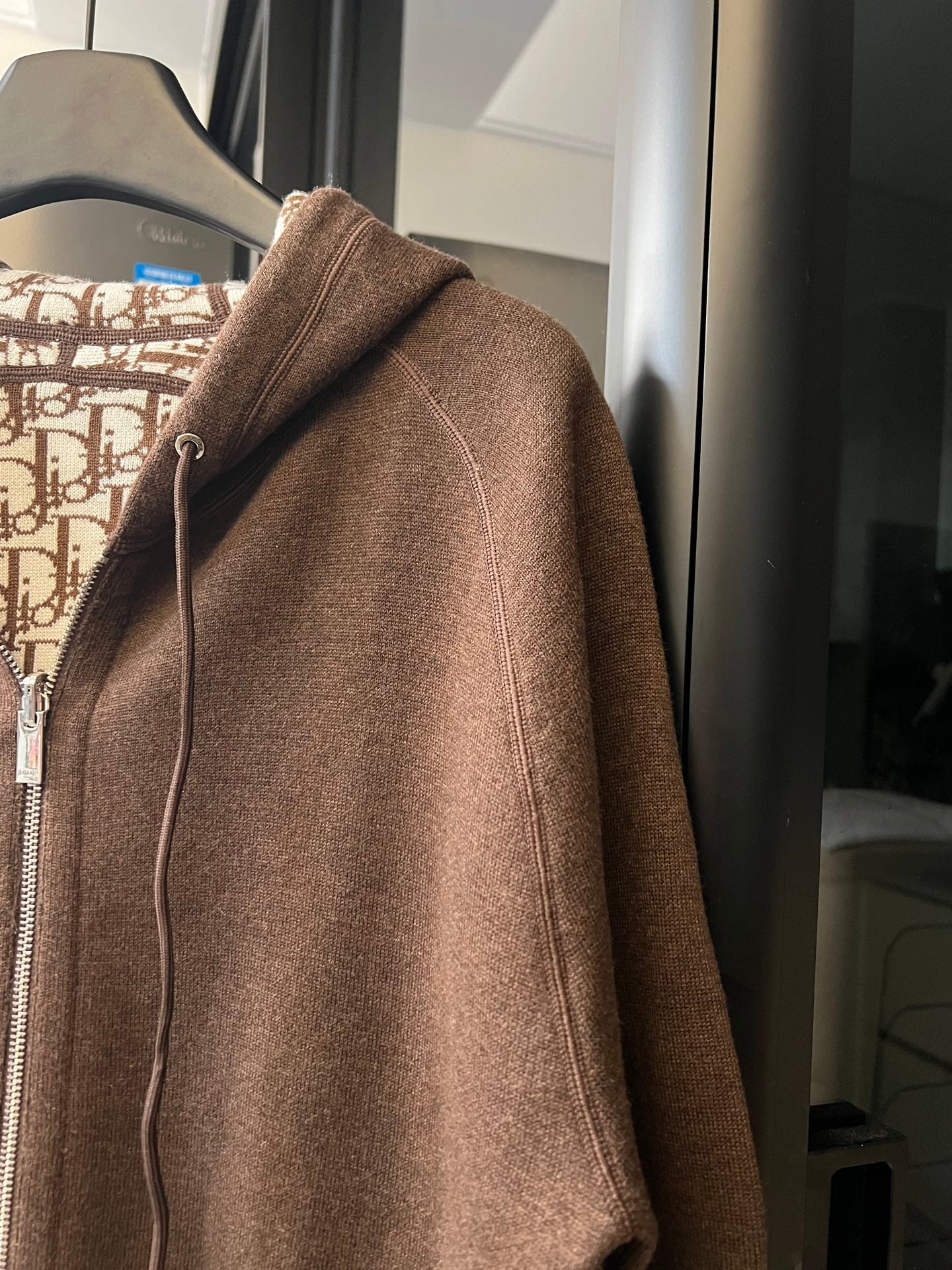 Dior brown zip-up hoodie with drawstring hood and side seam