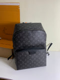 Louis Vuitton monogram backpack with front zipper pocket, dark gray leather trim