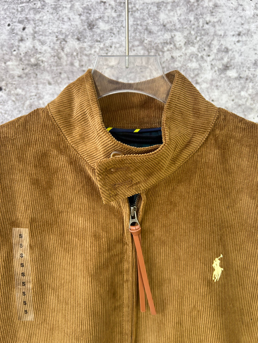 Ralph Lauren corduroy jacket close-up, tan stand collar and zip with polo logo