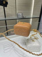 Mini quilted crossbody bag, tan with embossed CC logo and gold chain strap