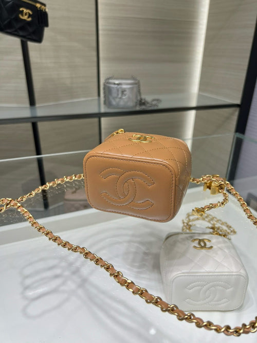 Mini quilted crossbody bag, tan with embossed CC logo and gold chain strap