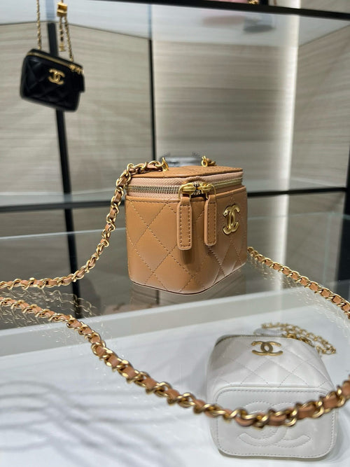 Chanel mini quilted crossbody bag, beige leather with gold chain and CC clasp