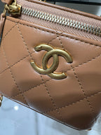 Mini quilted bag, tan leather with gold CC logo and zip closure details