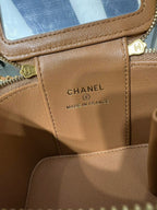 Chanel leather bag interior label: CHANEL and MADE IN FRANCE on tan lining
