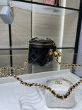 Chanel mini crossbody bag, black quilted leather with gold chain and zip top