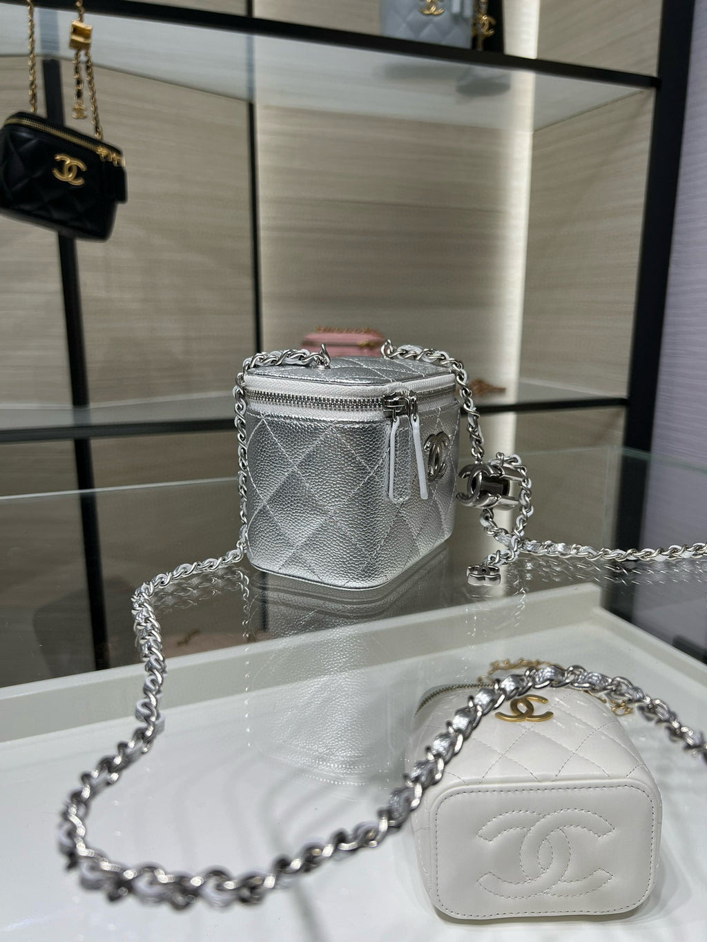 Silver quilted crossbody bag with chain strap and mini flap, CC emblem