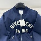 Dark blue bomber jacket with zip front and large "Givenchy Paris" graphic