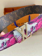 Louis Vuitton belt with pink floral strap and silver LV buckle, angled close-up.