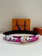 Louis Vuitton belt with pink floral canvas strap and silver LV buckle.