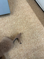 Taupe faux-fur slide sandal showing slender heel and fur toe