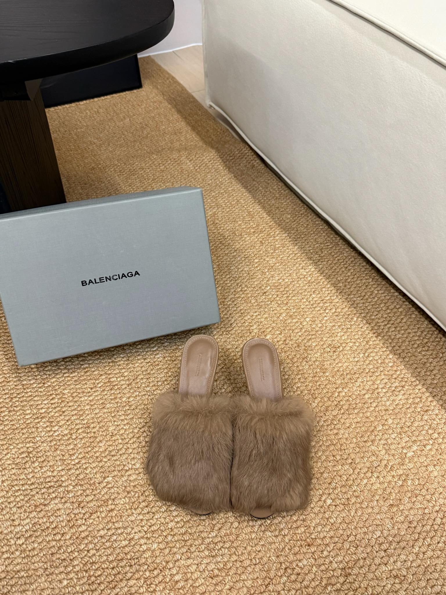 Taupe faux-fur slide sandals with open toe and slim, clear toe strap