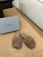 Taupe faux-fur slide mules with open toe and low, dark heel