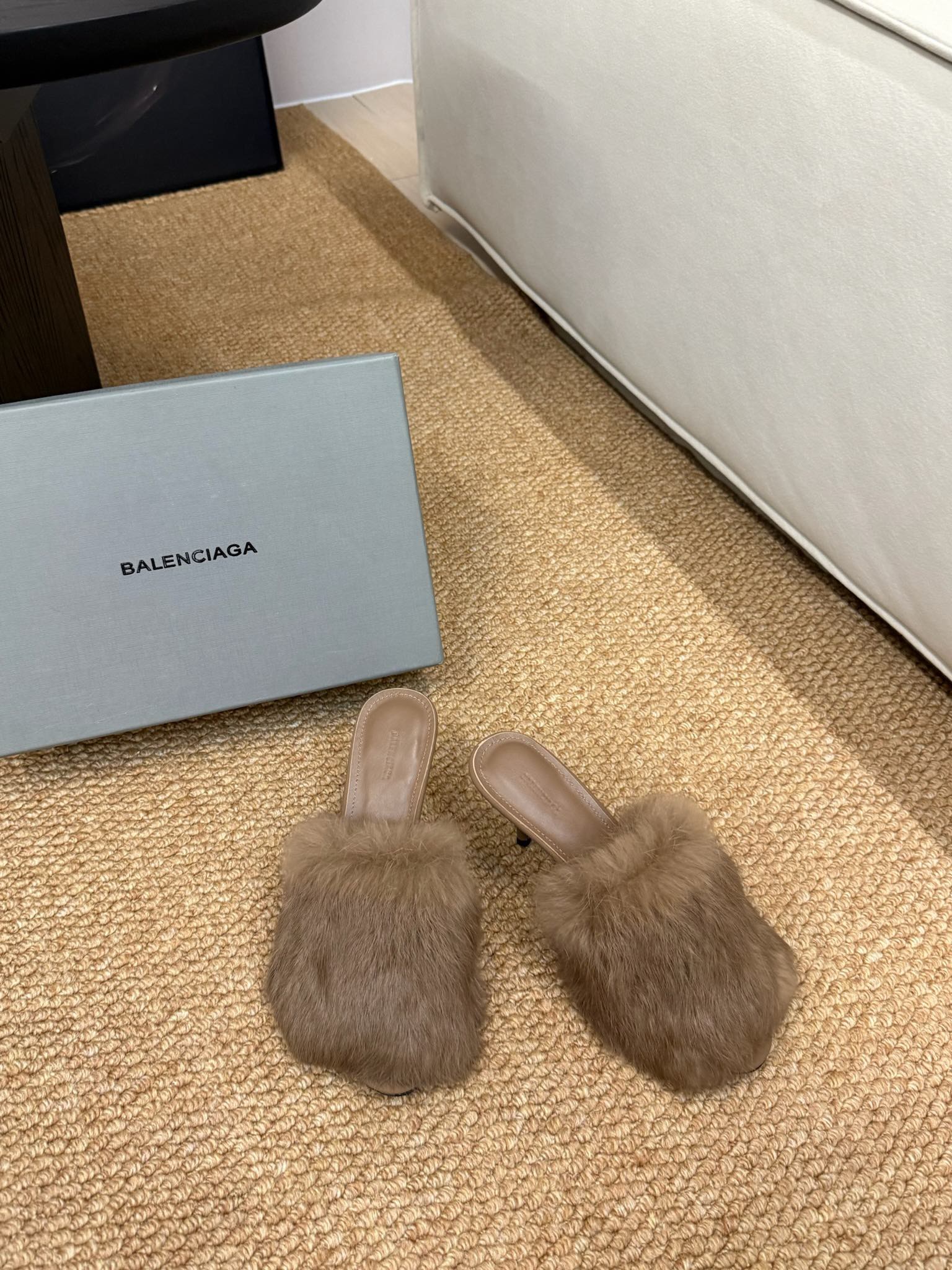 Taupe faux-fur slide mules with open toe and low, dark heel