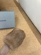 Taupe faux-fur slip-on sandal with open toe and textured fur upper
