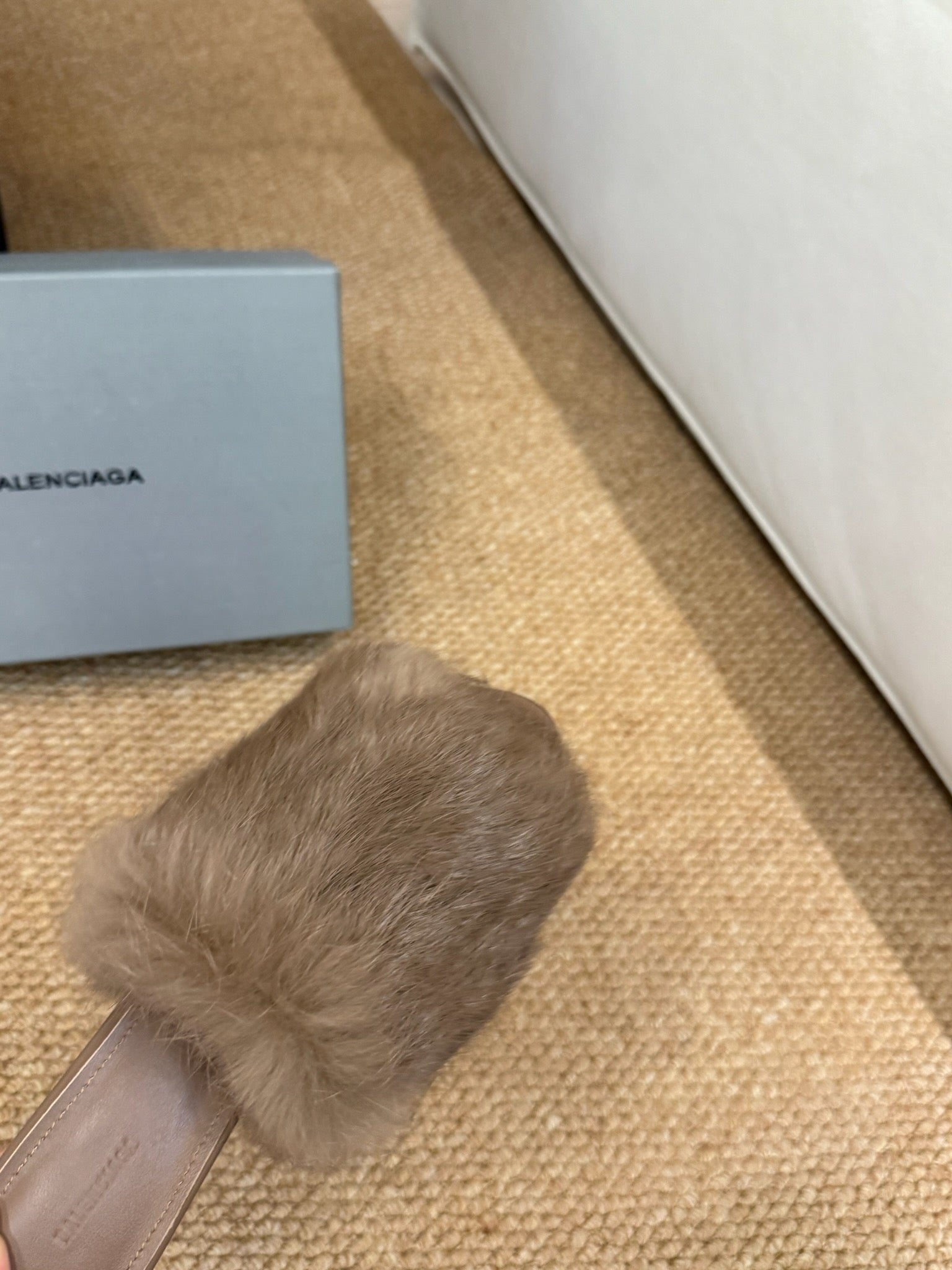 Taupe faux-fur slip-on sandal with open toe and textured fur upper