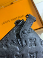 Louis Vuitton embossed monogram leather with snap and circular logo detail, dark gray