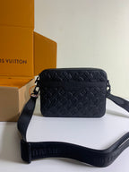 Louis Vuitton crossbody bag in dark monogram leather, zip top and logo strap