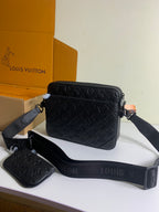 Louis Vuitton crossbody bag with matching mini pouch, dark monogram, zip closure