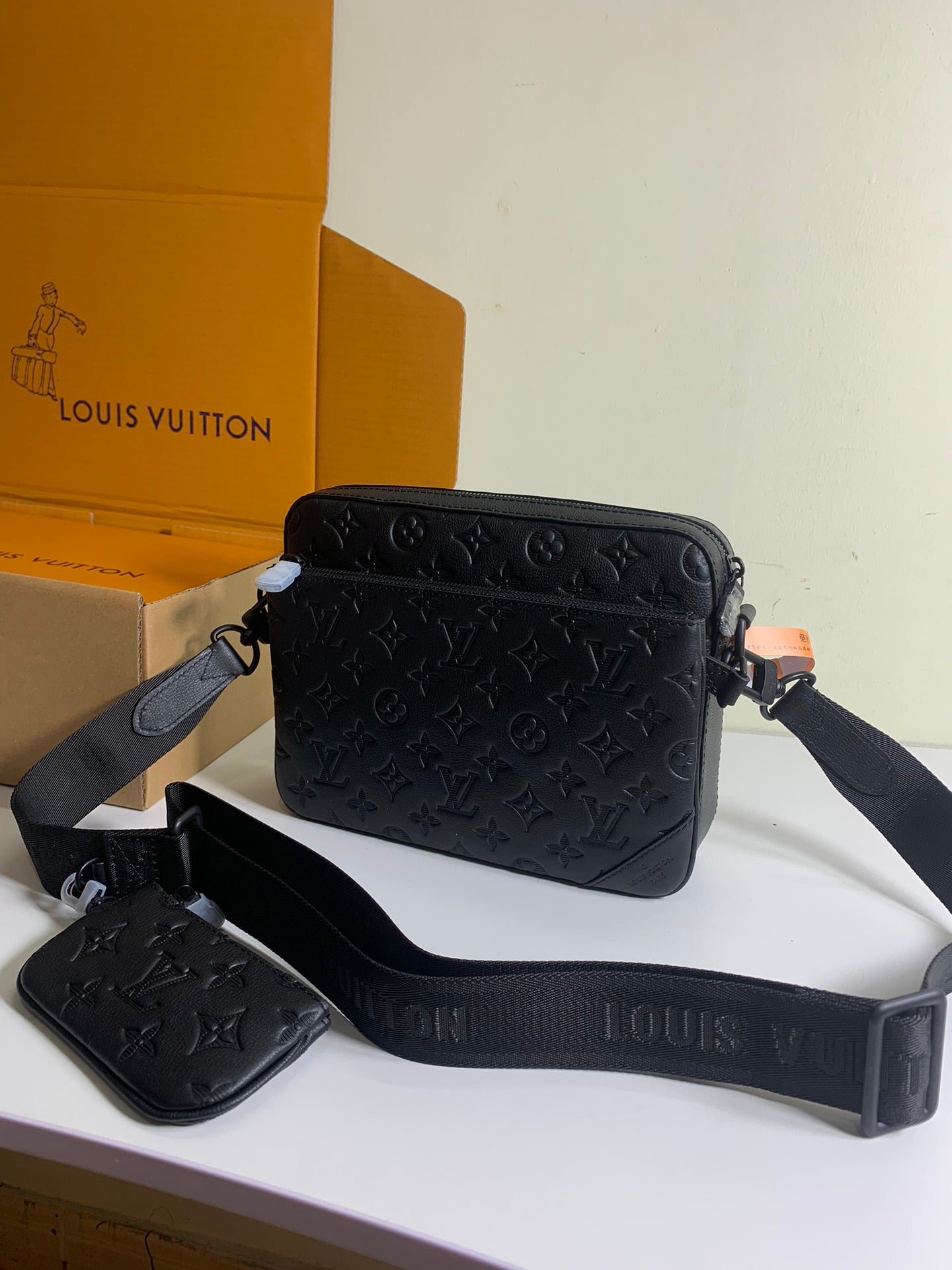 Louis Vuitton crossbody bag with matching mini pouch, dark monogram, zip closure