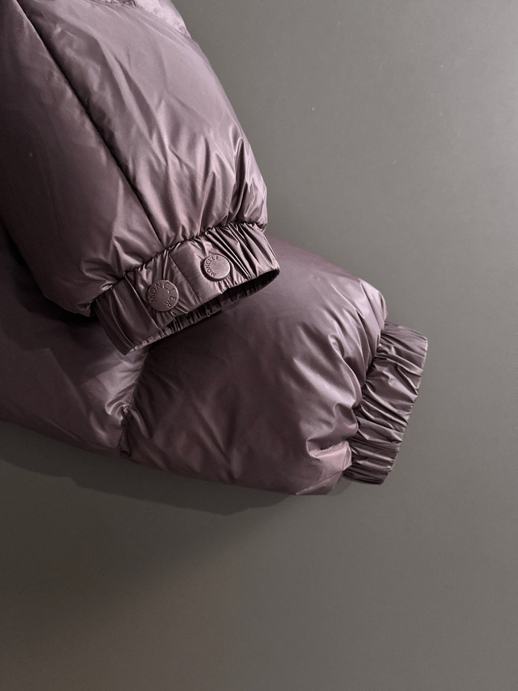 Moncler puffer jacket cuff, dark plum with logo patch and elastic hem
