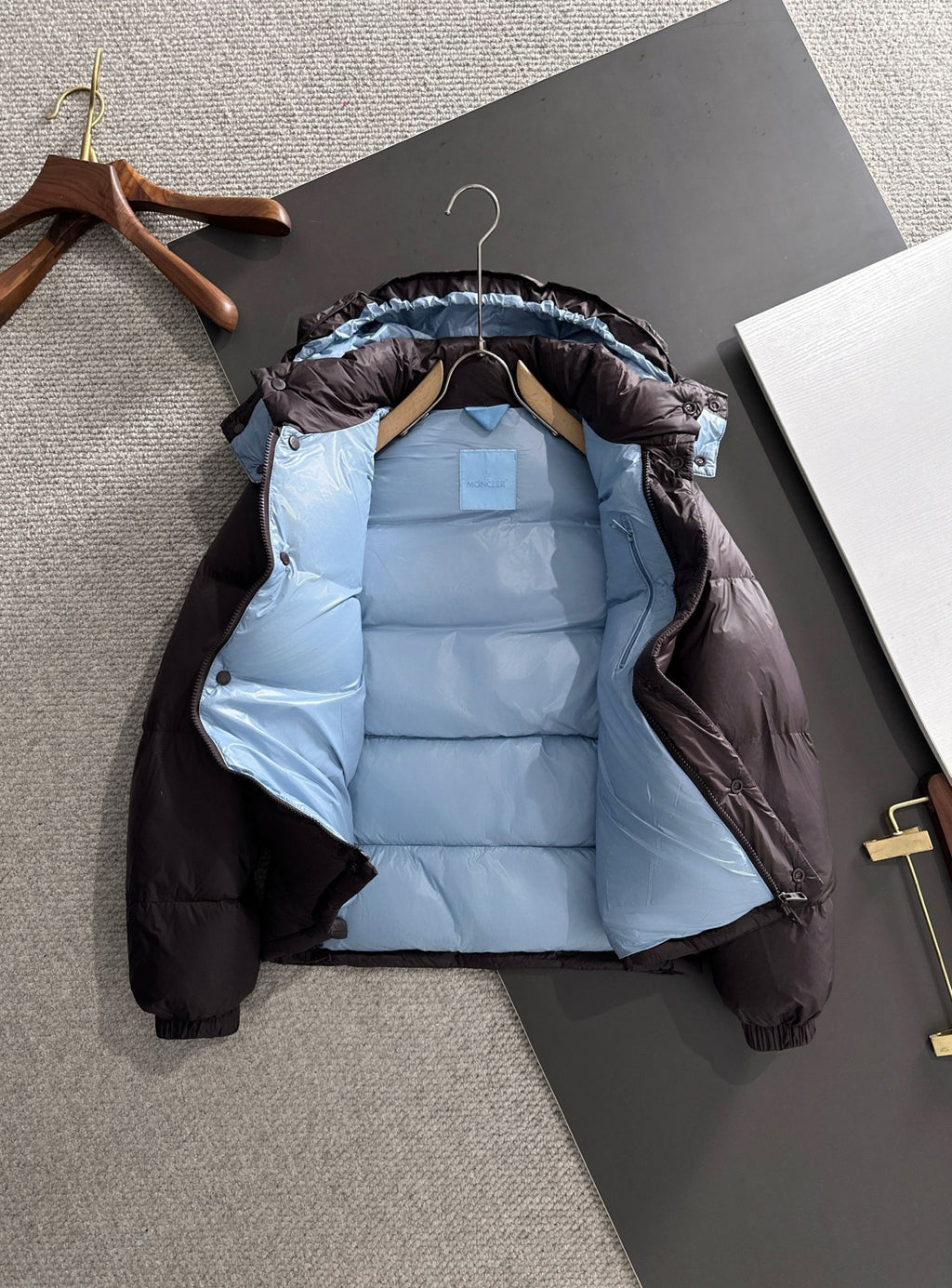 Moncler hooded puffer jacket, dark shell, light blue interior lining