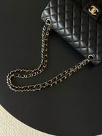 Chanel quilted shoulder bag in dark navy with gold-tone chain strap