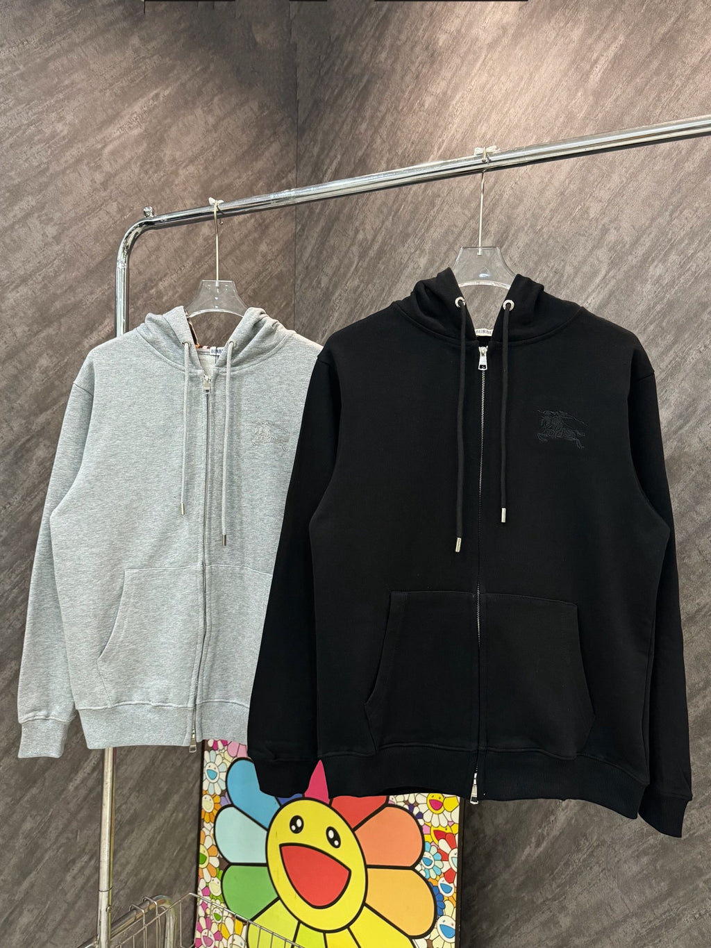 Zip-up hoodies in black and light gray with Burberry horse logo details