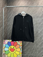 Black zip-up hoodie with drawstring hood and small Burberry horse logo